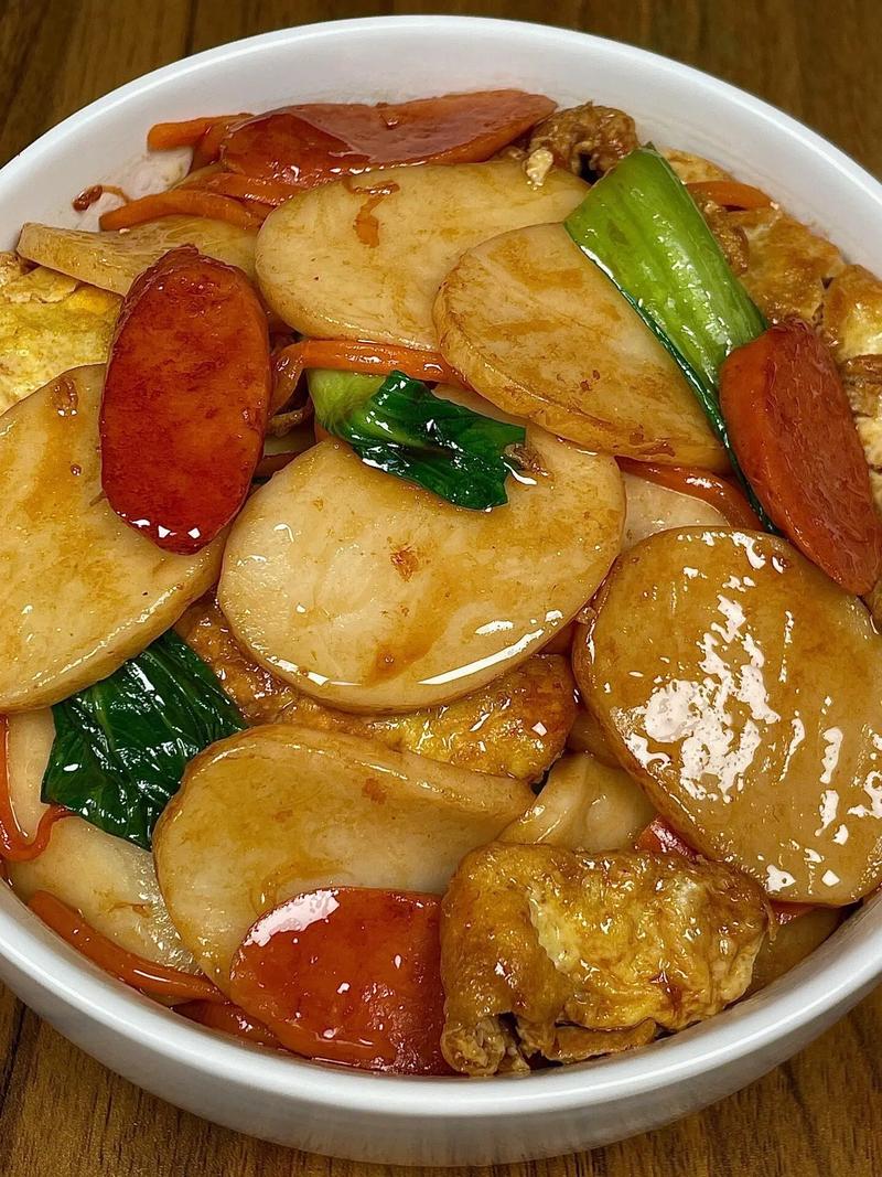 新疆正宗炒年糕怎么做?-第1张图片-花冠旅游服务 新疆正宗炒年糕怎么做?-第1张图片-花冠旅游服务