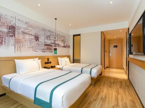 湛江西站附近宾馆哪里找？-第1张图片-花冠旅游服务